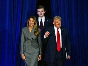 Donald Trump (R) arrives for an election night event alongside former US First Lady Melania Trump and his son Barron Trump at the West Palm Beach Convention Center in West Palm Beach, Florida, on November 6, 2024. (Photo by Jim WATSON / AFP) Barron Trump, Donald Trump