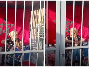 Man places his disabled sister in a cage to protests authorities in Morocco. (Facebook) disabled sister