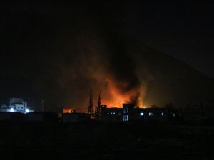 Syrians check the damage after Israeli troops