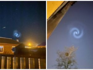 Photo of the strange swirling-like lights in the sky. (X) Photo of the strange lights in the sky. (X)