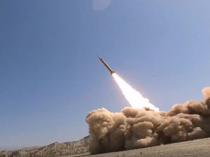 Iran unveils advanced ballistic missile and warns US and Israel of severe retaliation