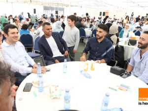A vibrant and engaging atmosphere during Orange Jordan’s Family Day for employees
