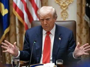 US President Donald Trump speaks during a meeting with Argentina's President Javier Milei in the Cabinet Room at the White House in Washington, DC on October 14, 2025. AFP Trump threatens 500% tariffs on China ahead of potential APEC summit with Xi Jinping