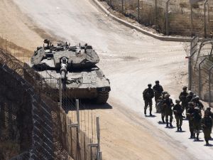 Israeli troops patrol the border fence with Syria near the Druze village of Majdal Shams in the Israel-annexed Golan Heights on July 23, 2025. Golan Heights