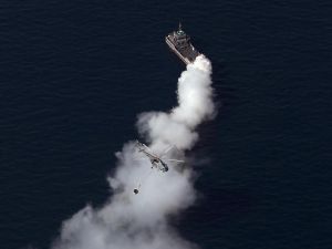 Crew rescued after sanctioned tanker catches fire in suspected attack off Oman
