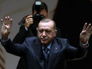 Turkey's President and leader of the Justice and Development Party (AKP) Recep Tayyip Erdogan gestures during the AKP's extended meeting of provincial heads at the party's headquarters in Ankara on Feb. 23, 2018. 
(ADEM ALTAN / AFP)