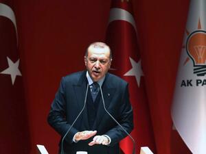 Turkey's President and leader of the Justice and Development Party (AKP) Recep Tayyip Erdogan delivers a speech during the AKP's extended meeting of provincial heads at the party's headquarters in Ankara on Feb. 23, 2018. 
(ADEM ALTAN / AFP)