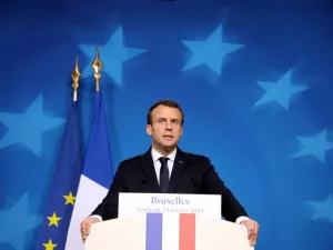 (FILES) French President Emmanuel Macron gestures as he addresses a press conference at the end of the European Council summit in Brussels on Feb. 23, 2018. 
(Ludovic MARIN / AFP)