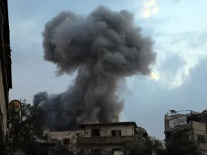 Smoke billows following a regime air strike on the rebel-held town of Haza, in the besieged Eastern Ghouta region on the outskirts of the capital Damascus, on Feb. 23, 2018. Syrian regime air strikes and artillery fire hit the rebel-held enclave of Eastern Ghouta for a sixth straight day killing 32 civilians, as the world struggled to reach a deal to stop the carnage.
(AMER ALMOHIBANY / AFP)
