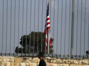 A picture taken on Feb. 24, 2018, shows the U.S. flag flying over the U.S. consulate building complex in Jerusalem, which is considered one of the options to host the new U.S. embassy headquarters after its relocation from Tel Aviv. The United States will move its embassy from Tel Aviv to Jerusalem in May 2018 to coincide with Israel's 70th Independence Day according to U.S. officials.
(AHMAD GHARABLI / AFP)