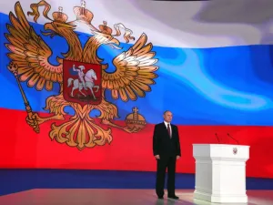 Russian President Vladimir Putin stands on the stage while addressing the Federal Assembly at Moscow's Manezh exhibition centre on Mar. 01, 2018. 
(Mikhail KLIMENTYEV / SPUTNIK / AFP)