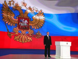 Russian President Vladimir Putin stands on the stage while addressing the Federal Assembly at Moscow's Manezh exhibition centre on Mar. 01, 2018. 
(Mikhail KLIMENTYEV / SPUTNIK / AFP)