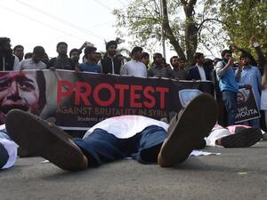 Pakistani students stage a protest against the ongoing conflict in Syria, in Lahore on Mar. 2, 2018. More than 340,000 people have been killed across Syria since its civil war started in 2011 with the brutal repression of anti-government protests.
(ARIF ALI / AFP)