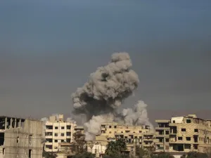 A general view shows smoke billowing in Hazeh, in the rebel enclave of Eastern Ghouta on the outskirts of Damascus on Mar. 15, 2018 during reported shelling by Syrian government forces. Seven years of conflict in Syria have left more than 350,000 people dead, according to an updated overall death toll released today by the Syrian Observatory for Human Rights.
(AMER ALMOHIBANY / AFP)
