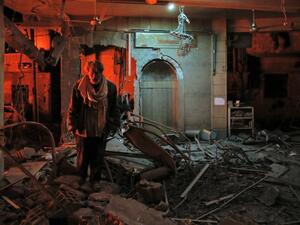 A man walks inside a mosque after an air strike in Douma, Eastern Ghouta, on Mar.19, 2018. The regime did not completely release the pressure on Douma however, the latest strikes killing at least 13 people overnight, the Syrian Observatory for Human Rights said. (HASAN MOHAMED / AFP)