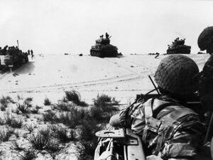 Israeli armored forces in action in this photo taken in June 1967 in the Sinai Desert. Thirty years after the six-day war, new revelations show that Israeli generals exerted considerable pressure to push their government to go into battle. According to military historian Ami Gluska of the Hebrew University in Jerusalem, "a gap separated government officials from soldiers who were on average more than 20 years younger and who were burning to go to war". (STF / AFP)