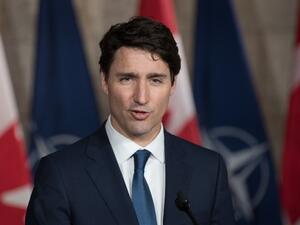 Canadian Prime Minister Justin Trudeau speaks during a joint media availability with NATO Secretary General, Jens Stoltenberg in Ottawa, Ontario, on Apr. 4, 2018. 
(Lars Hagberg / AFP)