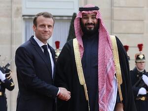 French President Emmanuel Macron debates with Saudi Crown Prince possibility of launching strikes against Syrian regime targets (AFP/ File Photo)