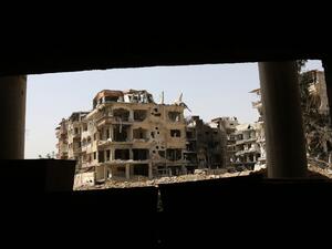 A general view shows destroyed buildings in the former rebel-held Syrian town of Douma on the outskirts of Damascus on Apr. 19, 2018, five days after the Syrian army declared that all anti-regime forces have left Eastern Ghouta, following a blistering two month offensive on the rebel enclave. The regime in February launched a blistering assault on Eastern Ghouta, a semi-rural area within mortar range of central Damascus that had been in opposition hands for six years. (STRINGER / AFP)