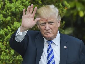 U.S. President Donald Trump waves after he arrived at the White House on May 4, 2018 in Washington, DC. 
(Andrew CABALLERO-REYNOLDS / AFP)