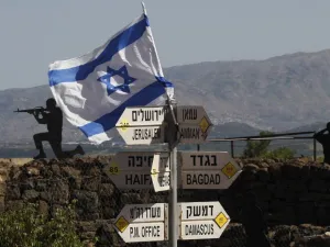 An Israeli flag is seen placed on Mount Bental in the Israeli-annexed Golan Heights on May 10, 2018. Israel's army said today it had carried out widespread raids against Iranian targets in Syria overnight after rocket fire towards its forces it blamed on Iran, marking a sharp escalation between the two enemies. Israel carried out the raids after it said around 20 rockets, either Fajr or Grad type, were fired from Syria at its forces in the occupied Golan Heights at around midnight.
(JALAA MAREY / AFP)