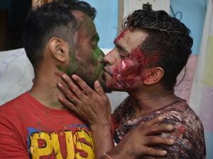 Indian members and supporters of the lesbian, gay, bisexual, transgender (LGBT) community celebrate the Supreme Court decision to strike down a colonial-era ban on gay sex, in Siliguri on September 6, 2018 /AFP