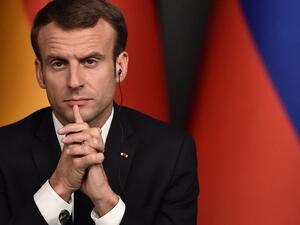 French President Emmanuel Macron, attends a conference during a summit called to attempt to find a lasting political solution to the civil war in Syria  (AFP)