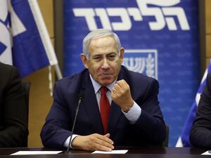 Israeli Prime Minister Benjamin Netanyahu (C) delivers a statement at the Israeli Parliament in Jerusalem, on December 24, 2018. (AFP/File)