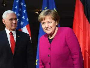 German Chancellor Angela Merkel (R) and US Vice President Mike Pence pose during a photo call at the 55th Munich Security Conference in Munich, southern Germany, on February 16, 2019. The 2019 edition of the Munich Security Conference (MSC) takes place from February 15 to 17, 2019. 
Christof STACHE / AFP