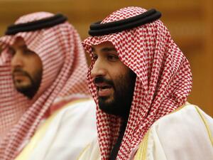 Saudi Crown Prince Mohammed bin Salman (R) attends a meeting with Chinese President Xi Jinping at the Great Hall of the People in Beijing on February 22, 2019. (AFP)