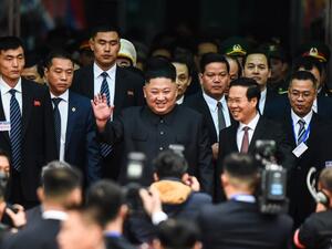 Kim Jong Un (C) waves after arriving at the Dong Dang railway station in Dong Dang, Lang Son province, on February 26, 2019, to attend the second US-North Korea summit. (AFP/ Nhac NGUYEN)