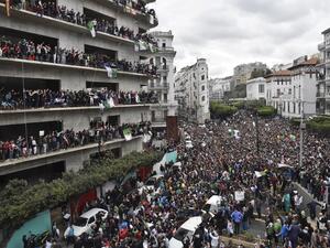 Algerian protesters demonstrate against their ailing president's bid for a fifth term in power, in Algiers on March 8, 2019. (RYAD KRAMDI / AFP)