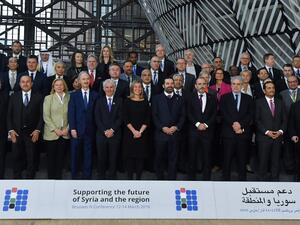 Officials pose for a photograph during the third Brussels conference on "supporting future of Syria and the region" at the European Council in Brussels on March 14, 2019. (EMMANUEL DUNAND / AFP)