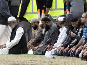Mourners pray while attending the funeral of Haji Mohammed Daoud Nabi, victim of New Zealand's twin mosque attacks, at Memorial Park Cemetery in Christchurch  (AFP)