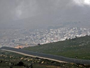 sraeli fence separating the Israeli-occupied sector of the Golan Heights near the Druze town (AFP)