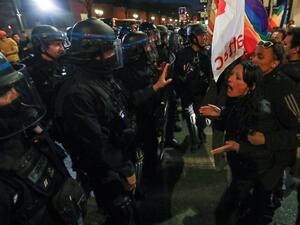 French gendarmes stand guard in front of people as they gather in the city of Nice on March 25, 2019. (AFP/ File Photo)