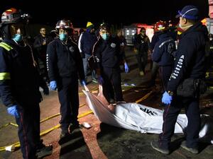 A truck driver barreled into a group of indigenous Guatemalans on March 28, killing 18 before fleeing the scene as police began a manhunt. (JOHAN ORDONEZ / AFP)