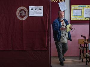 A man prepares to cast his ballot during the local elections in Istanbul on March 31, 2019 (AFP)