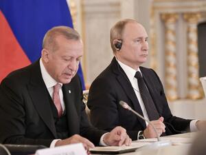 Turkish Presiddent Recep Tayyip Erdogan, (L) speaks next to Russian President Vladimir Putin during a meeting with Russian and Turkish businessmen at the Kremlin in Moscow on April 8, 2019. (Alexey NIKOLSKY / Sputnik / AFP)