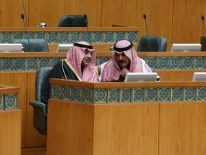 Kuwaiti MPs, Interior Minister Sheikh Mohammad al-Khaled al-Sabah (R) and Foreign Minister Sabah al-Khaled al-Sabah take part in a parliament session at Kuwait's National Assembly on January 13, 2016. (AFP/Yasser al-Zayyat)