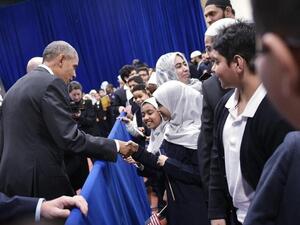 US President Barack Obama greets attendees in an overflow room after speaking at the Islamic Society of Baltimore, in Windsor Mill, Maryland,on February 3, 2016. (AFP/Mandel Ngan)