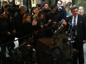 High Negotiations Committee (HNC) spokesman Salem al-Meslet (R) speaks during a press conference on the eve of the second round of Syrian peace talks in Geneva on March 13, 2016. (AFP/Phillipe Desmazes)