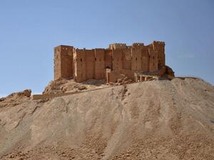 This file photo taken on May 18, 2015 shows a general view of the castle of the ancient Syrian city of Palmyra, a day after Daesh fired rockets into the city and killing five people. (AFP/File)