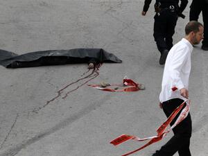 The body of a Palestinian assailant who was allegedly shot in the head by an Israeli soldier as he lay wounded on the ground Hebron on March 24, 2016. (AFP/Hazem Bader)