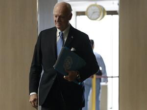 UN Syria envoy Staffan de Mistura arrives to a meeting with members of the opposition during Syrian peace talks at the United Nations Office in Geneva on March 24, 2016. (AFP/Fabrice Coffrini)