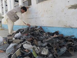 Footwear belonging to victims of a suicide attack on a Shiite mosque are seen in a pile outside the mosque premises a day after the attack, in Kabul on August 26, 2017. A suicide bomb and gun attack claimed by the Islamic State group on a Shiite mosque in Kabul killed 20 people and wounded scores more on August 25, officials said, the latest assault to highlight deteriorating security in Afghanistan.  (AFP)