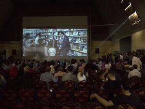 Palestinians attend the screening of "10 Years" at Samer Cinema in Gaza City on August 26, 2017. The Samer Cinema in Gaza City, the oldest in the strip and was built in 1944 but closed for decades, hosted a special screening of a film about Palestinians in Israeli prisons. (AFP)
