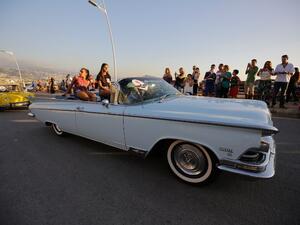 A participant drives a Buick Electra 225 during the Collection Cars Parade event in the Lebanese coastal city of Amchit on August 27, 2017.  (AFP)