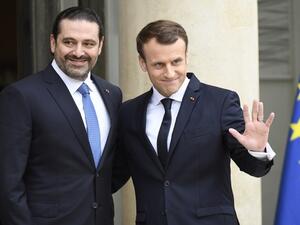 French President Emmanuel Macron welcomes Lebanese Prime Minister Saad Hariri at the Elysee Presidential Palace. (AFP/ File)