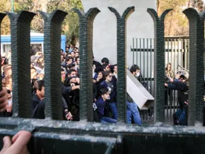 Iranian students scuffle with police at the University of Tehran during a demonstration driven by anger over economic problems, in the capital Tehran on Dec. 30, 2017 (STR/AFP)